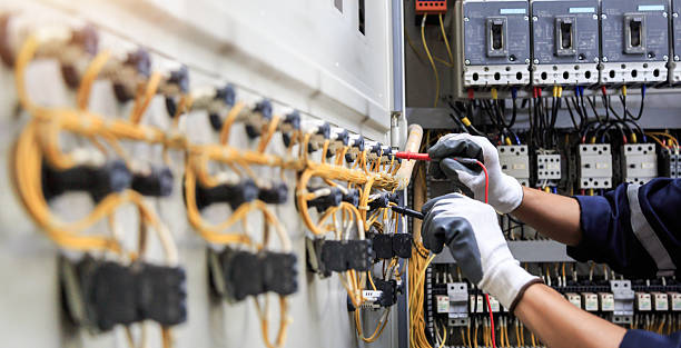 Professional Electrician technician working in Potomac, MD